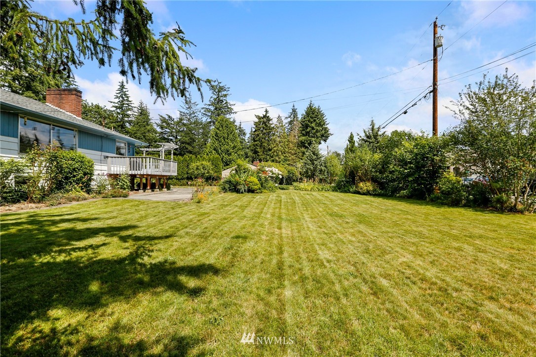 717 224th Street Southwest Bothell, WA 98021 - Photo 37 of 40 a view of a house with a yard