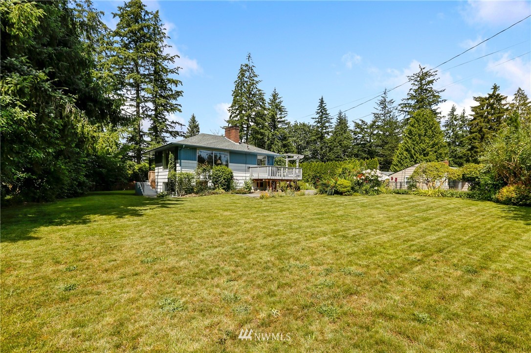 717 224th Street Southwest Bothell, WA 98021 - Photo 39 of 40 a front view of a house with yard and green space