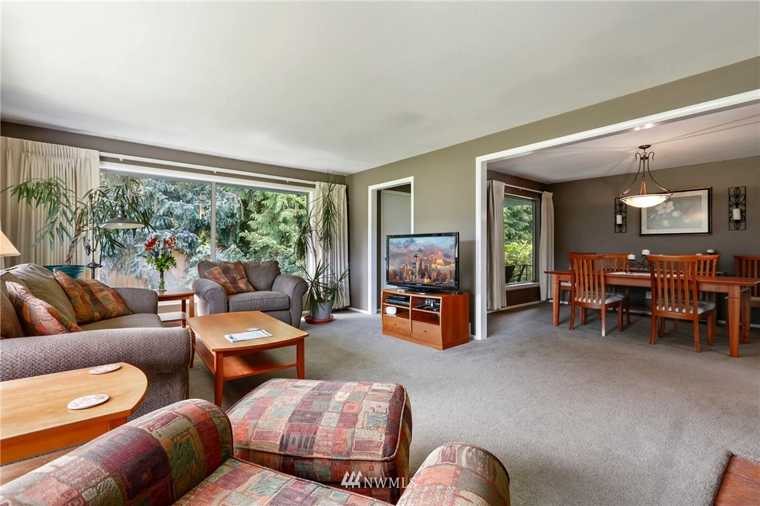 717 224th Street Southwest Bothell, WA 98021 - Photo 6 of 40 a living room with furniture and a flat screen tv