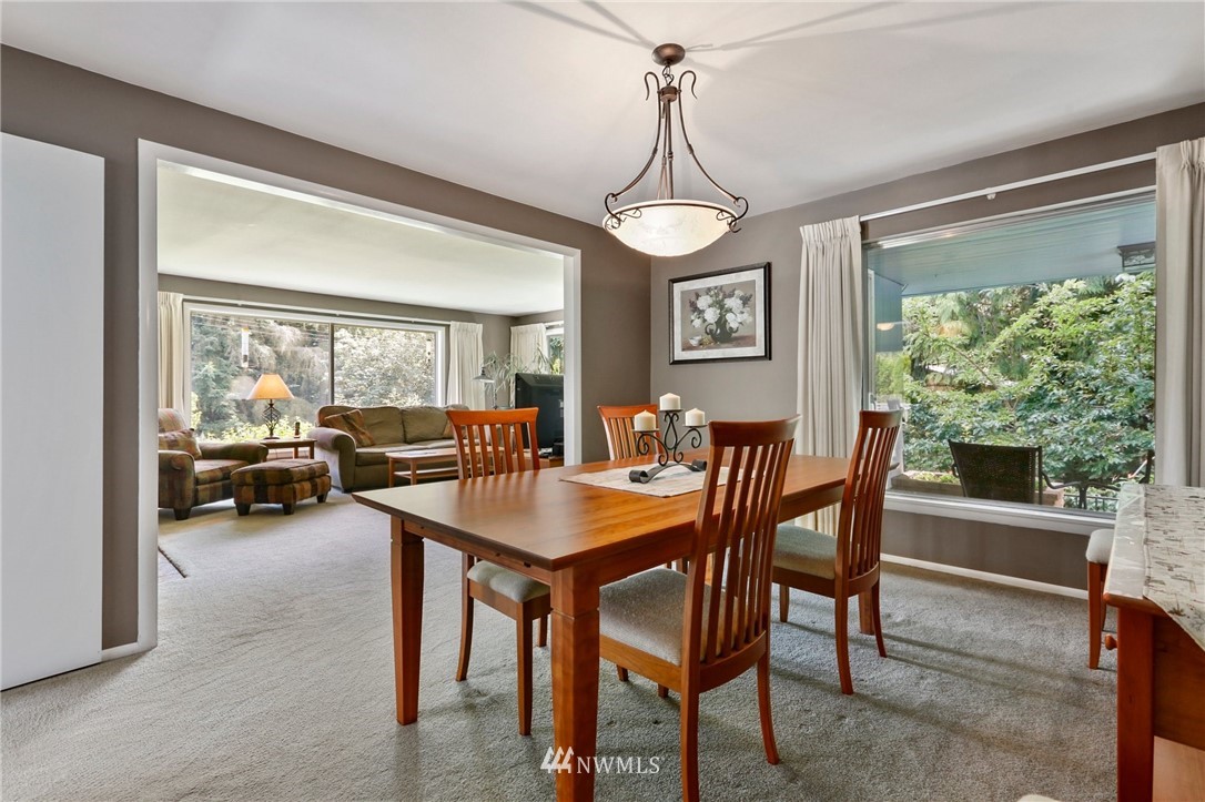 717 224th Street Southwest Bothell, WA 98021 - Photo 7 of 40 a view of a dining room with furniture window and outside view