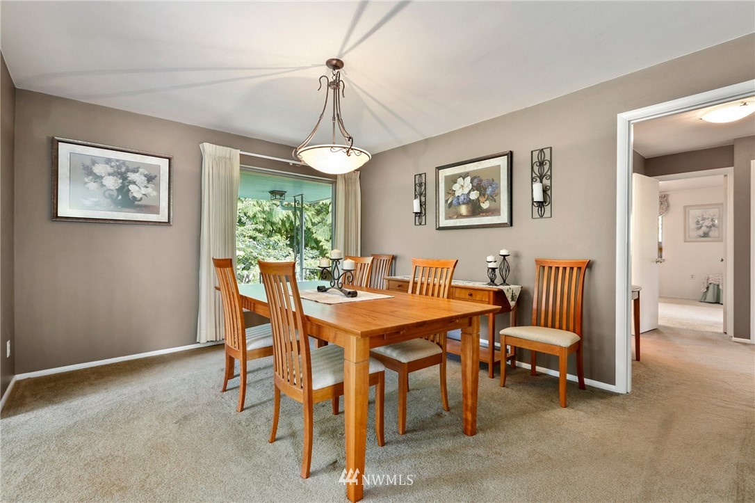 717 224th Street Southwest Bothell, WA 98021 - Photo 8 of 40 a view of a dining room with furniture window and outside view