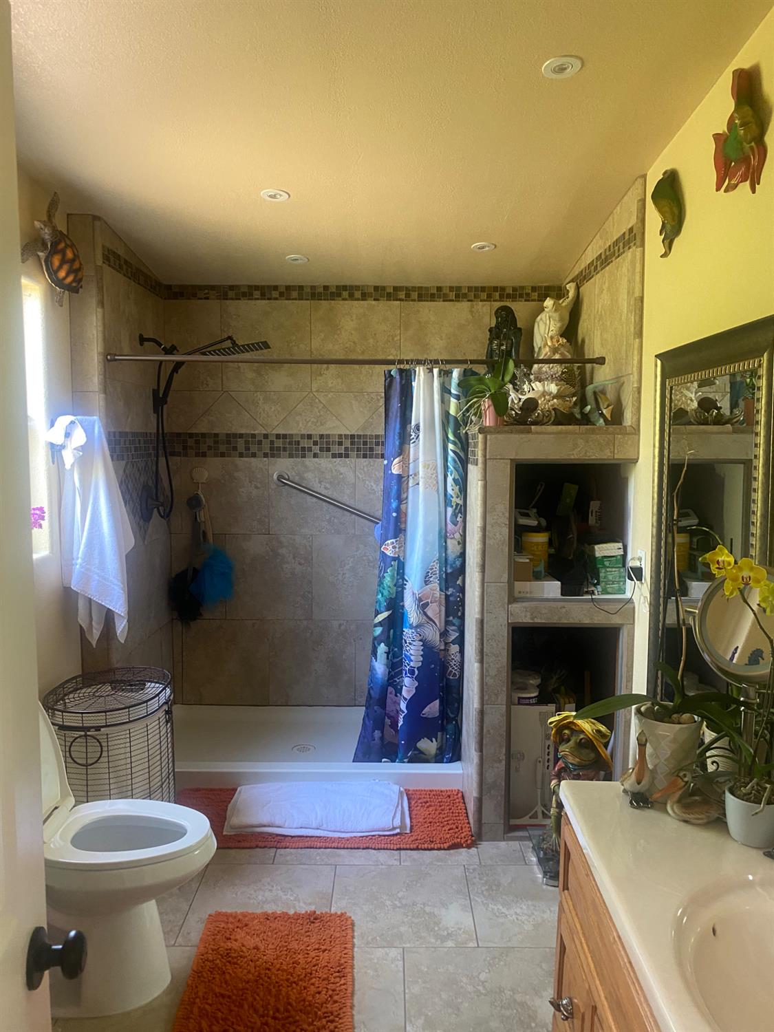 2575 South Willow, Unit 25 Fresno, CA 93725 - Photo 17 of 31 a bathroom with a sink toilet and shower