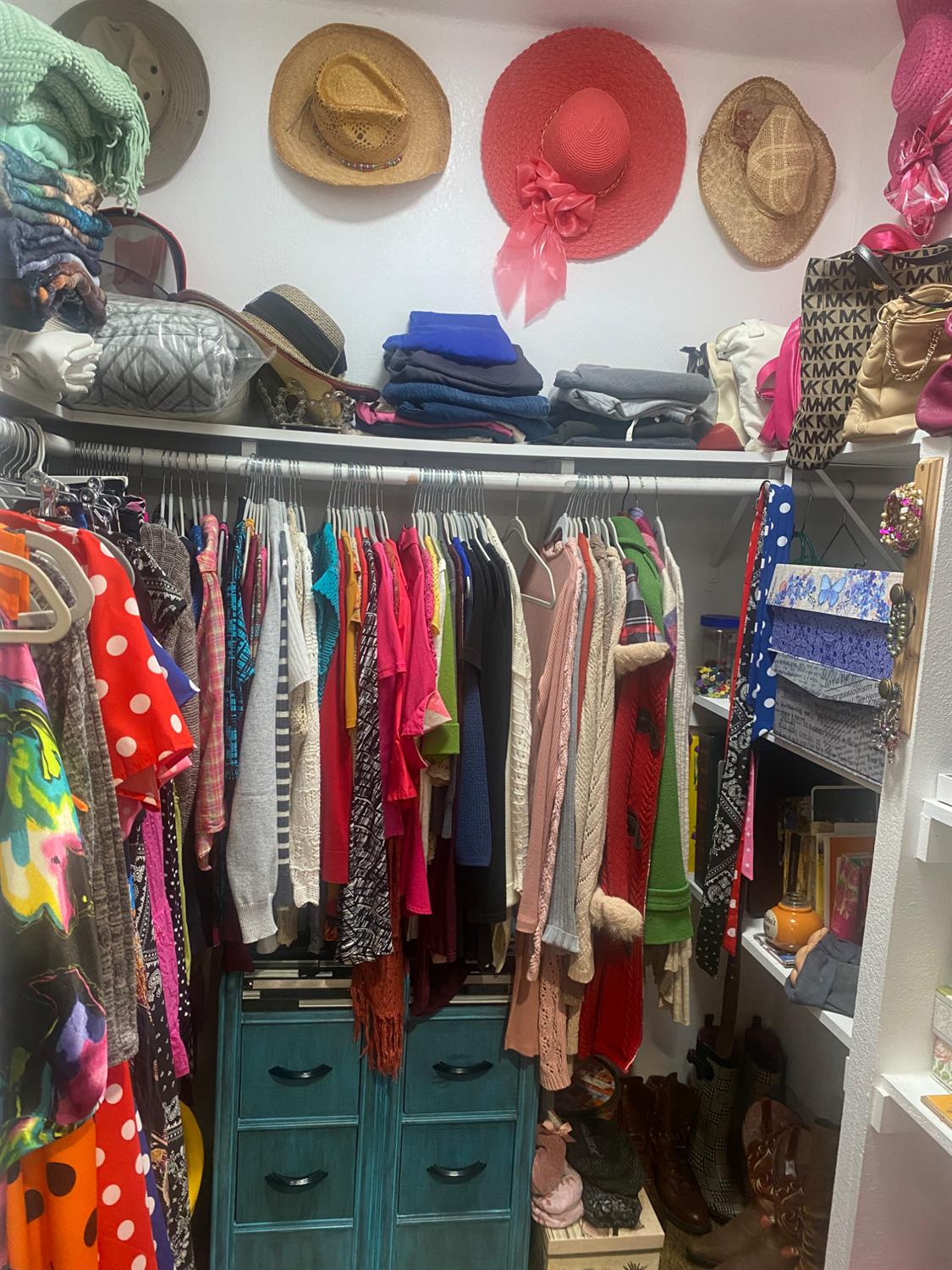 2575 South Willow, Unit 25 Fresno, CA 93725 - Photo 22 of 31 a view of walk in closet with clothes and shoes