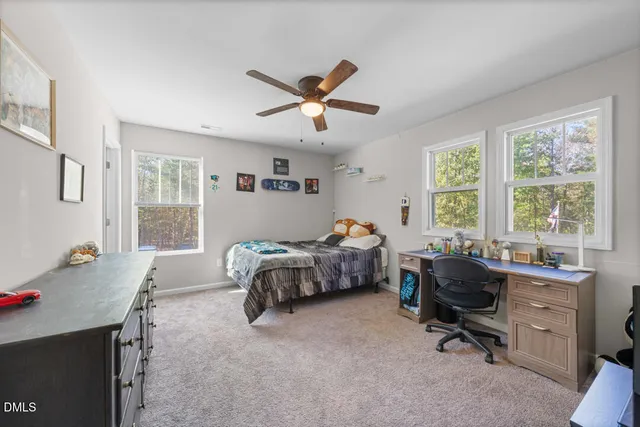 a bed room with a bed and a couch