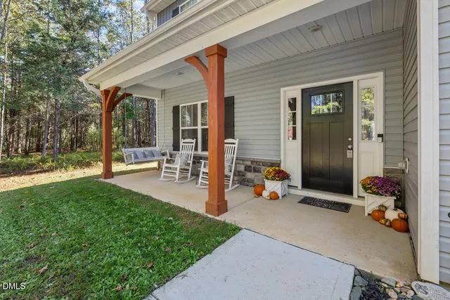 a living room with furniture fireplace and a flat screen tv