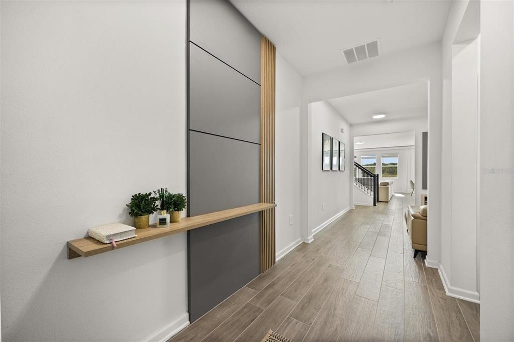 11163 Great Rock Street Winter Garden, FL 34787 - Photo 15 of 36 a hallway with wooden floor