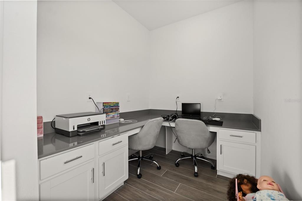 11163 Great Rock Street Winter Garden, FL 34787 - Photo 17 of 36 a view of a workspace with a window