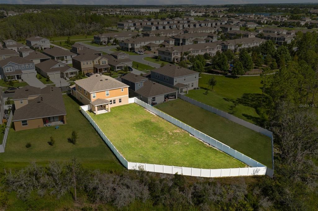 11163 Great Rock Street Winter Garden, FL 34787 - Photo 36 of 36 an aerial view of a house with a swimming pool yard and outdoor seating