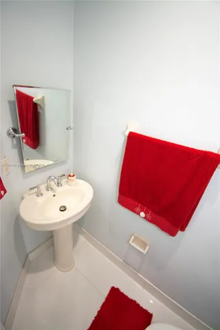 a bathroom with a toilet and a sink