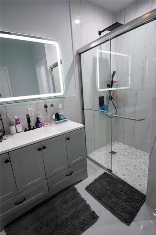 a bathroom with a toilet and a shower curtain