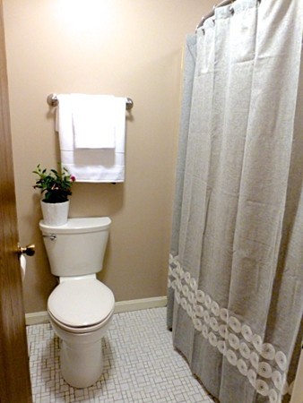 59 Mountain Gate Road, Unit 59 Ashland, MA 01721 - Photo 11 of 25 a bathroom with a toilet and a sink