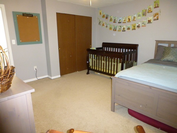 59 Mountain Gate Road, Unit 59 Ashland, MA 01721 - Photo 17 of 25 a bedroom with windows
