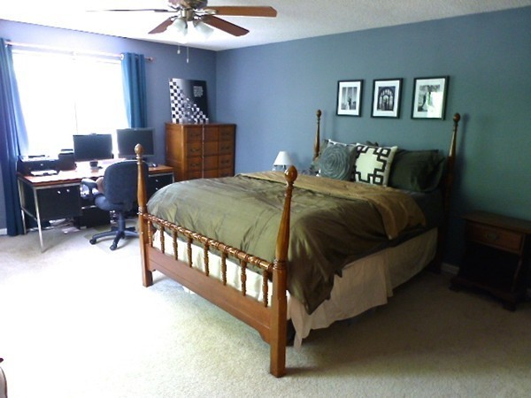 59 Mountain Gate Road, Unit 59 Ashland, MA 01721 - Photo 20 of 25 a spacious bedroom with a bed and a chandelier