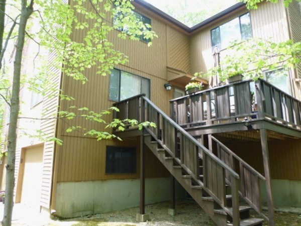59 Mountain Gate Road, Unit 59 Ashland, MA 01721 - Photo 21 of 25 a view of balcony with two plants