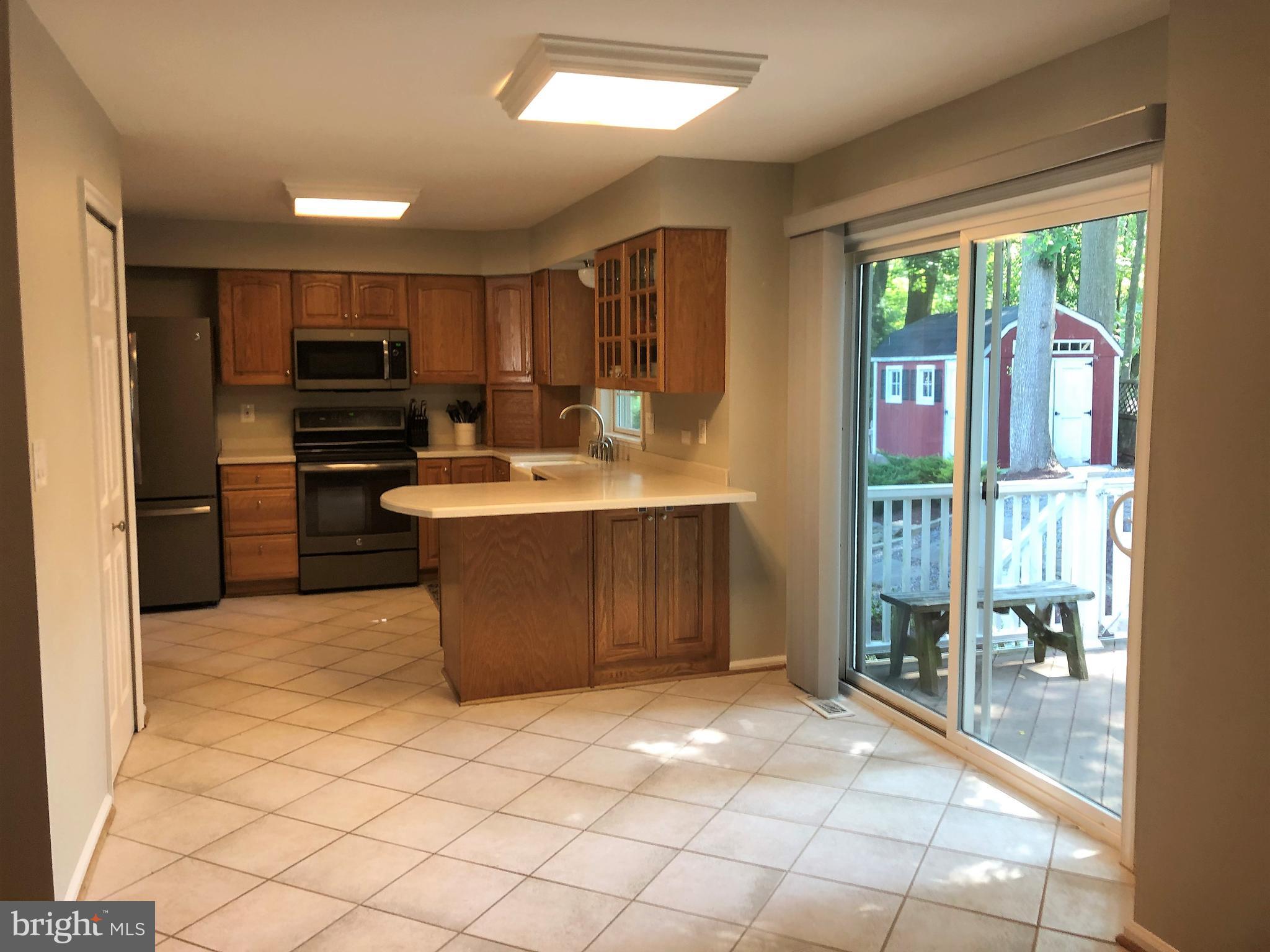8256 Rippling Branch Road Laurel, MD 20723 - Photo 8 of 36 Open-Concept Kitchen