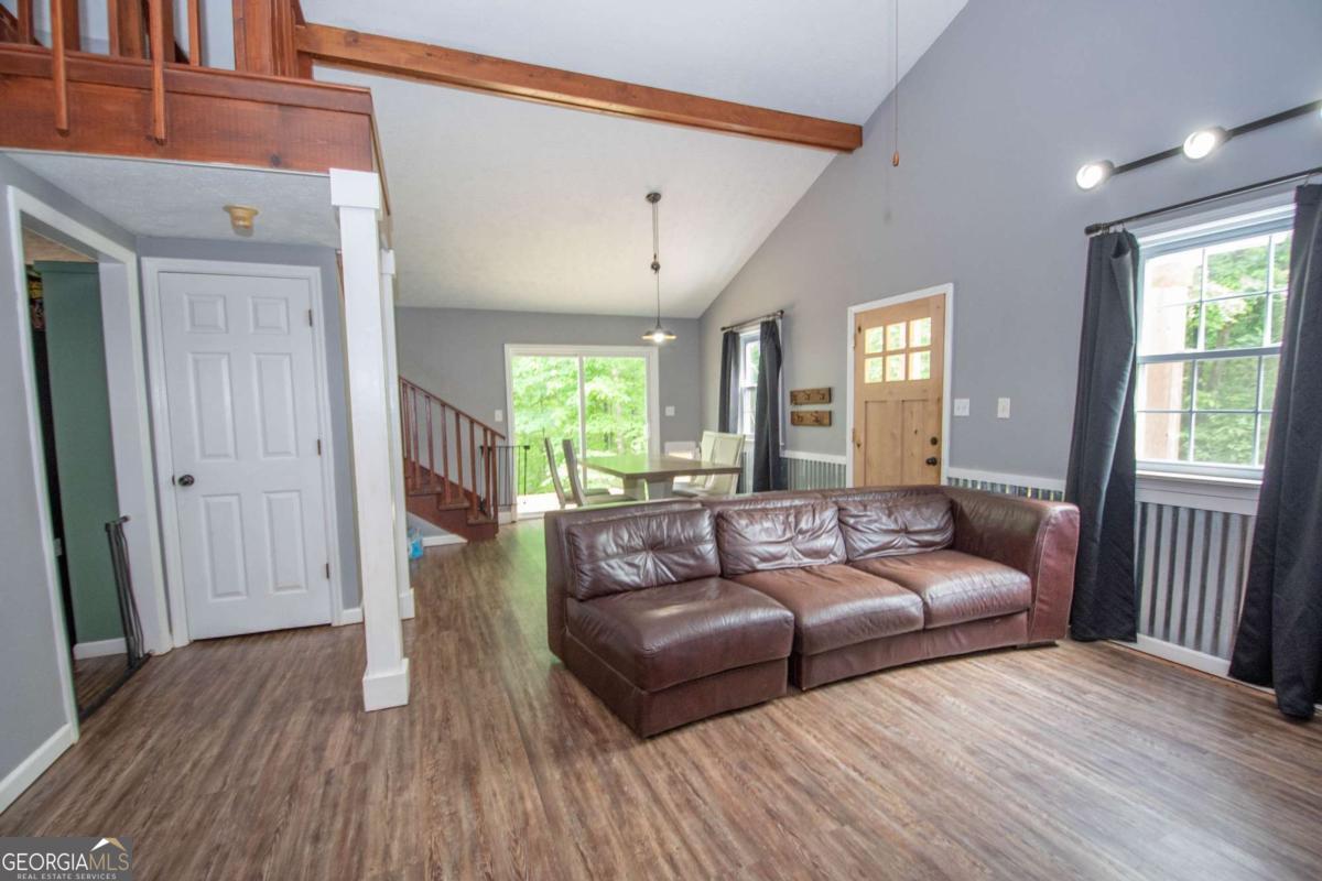 3414 Rock Mills Road LaGrange, GA 30240 - Photo 12 of 54 a living room with furniture and a wooden floor