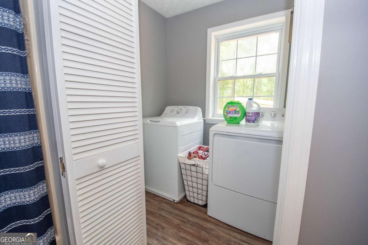3414 Rock Mills Road LaGrange, GA 30240 - Photo 23 of 54 a utility room with dryer and washer