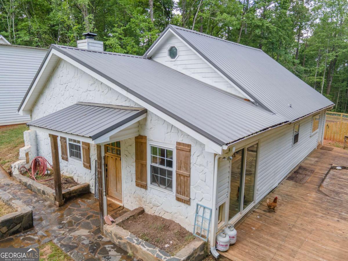 3414 Rock Mills Road LaGrange, GA 30240 - Photo 4 of 54 a aerial view of a house with a yard and balcony