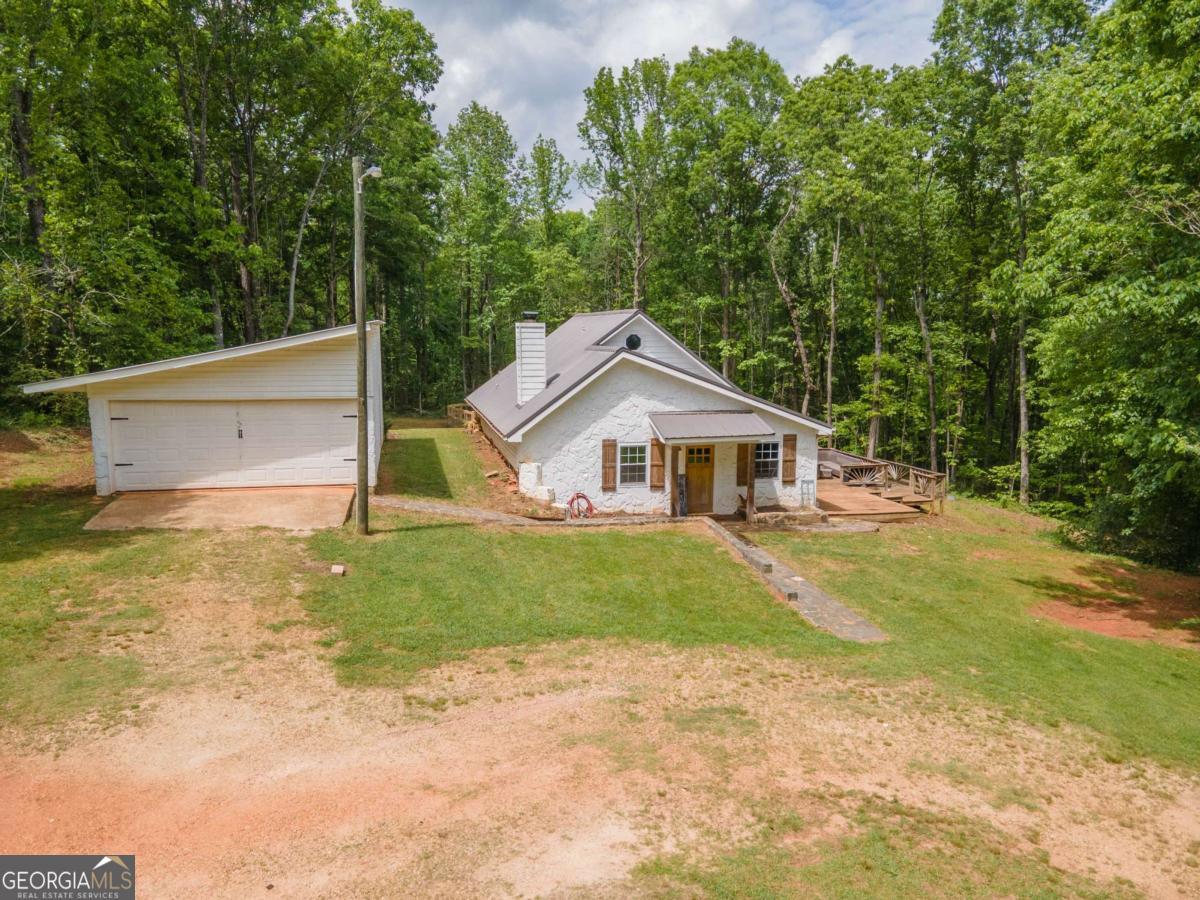 3414 Rock Mills Road LaGrange, GA 30240 - Photo 41 of 54 a front view of house with yard and green space