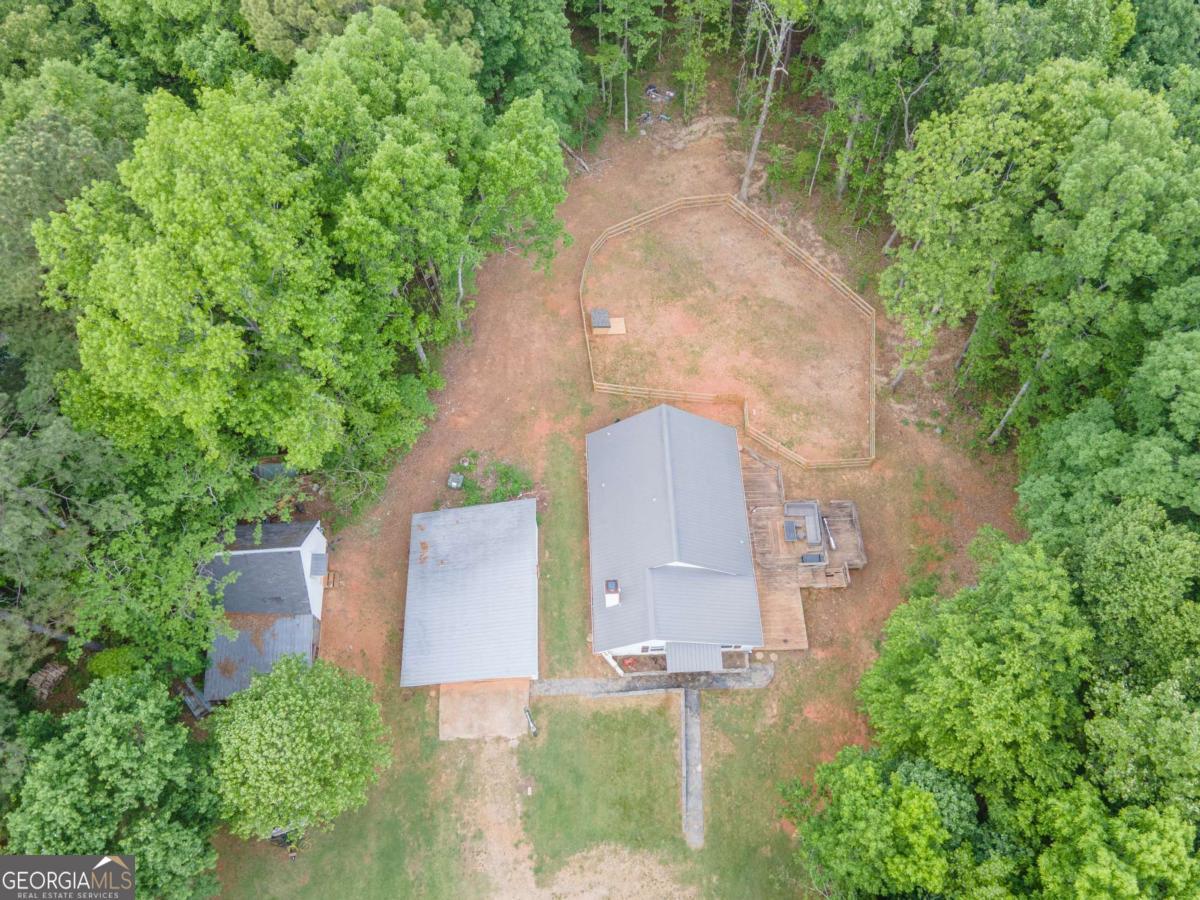 3414 Rock Mills Road LaGrange, GA 30240 - Photo 53 of 54 an aerial view of a house with outdoor space and trees all around