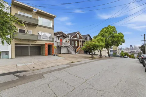 front view of a house with a street