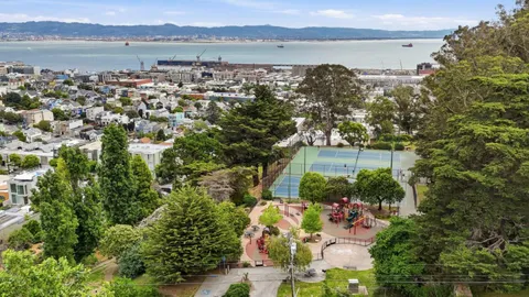 an aerial view of residential building and lake view
