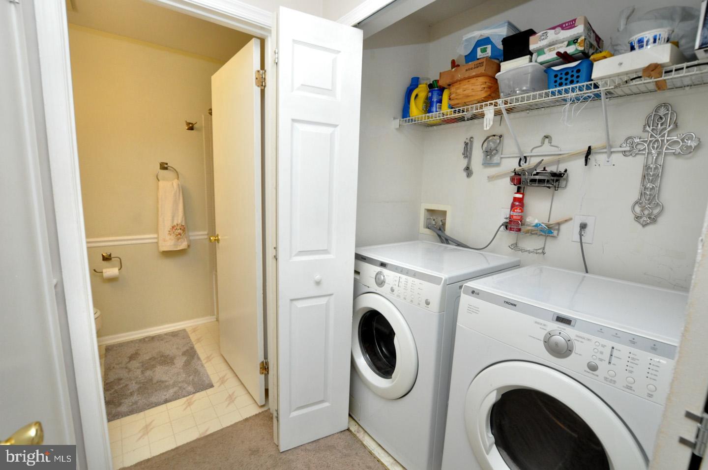 1505 Squirrel Road Evesham, NJ 08053 - Photo 12 of 23 a view of storage and utility room with washer and dryer