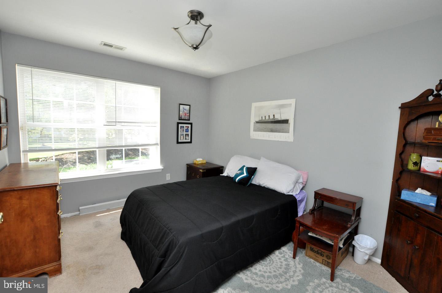 1505 Squirrel Road Evesham, NJ 08053 - Photo 15 of 23 a bedroom with a bed and a window