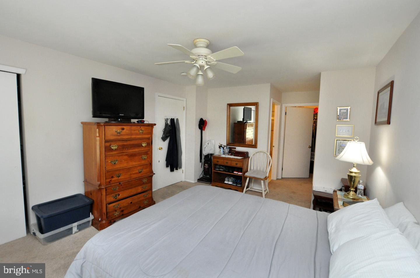 1505 Squirrel Road Evesham, NJ 08053 - Photo 19 of 23 a bedroom with a bed and a flat screen tv