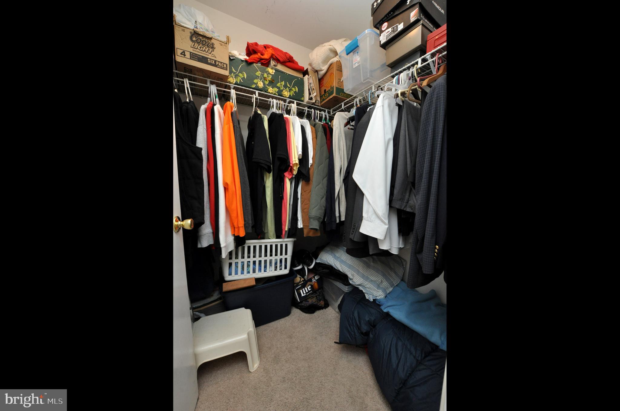 1505 Squirrel Road Evesham, NJ 08053 - Photo 21 of 23 a view of walk in closet with clothes and shoes