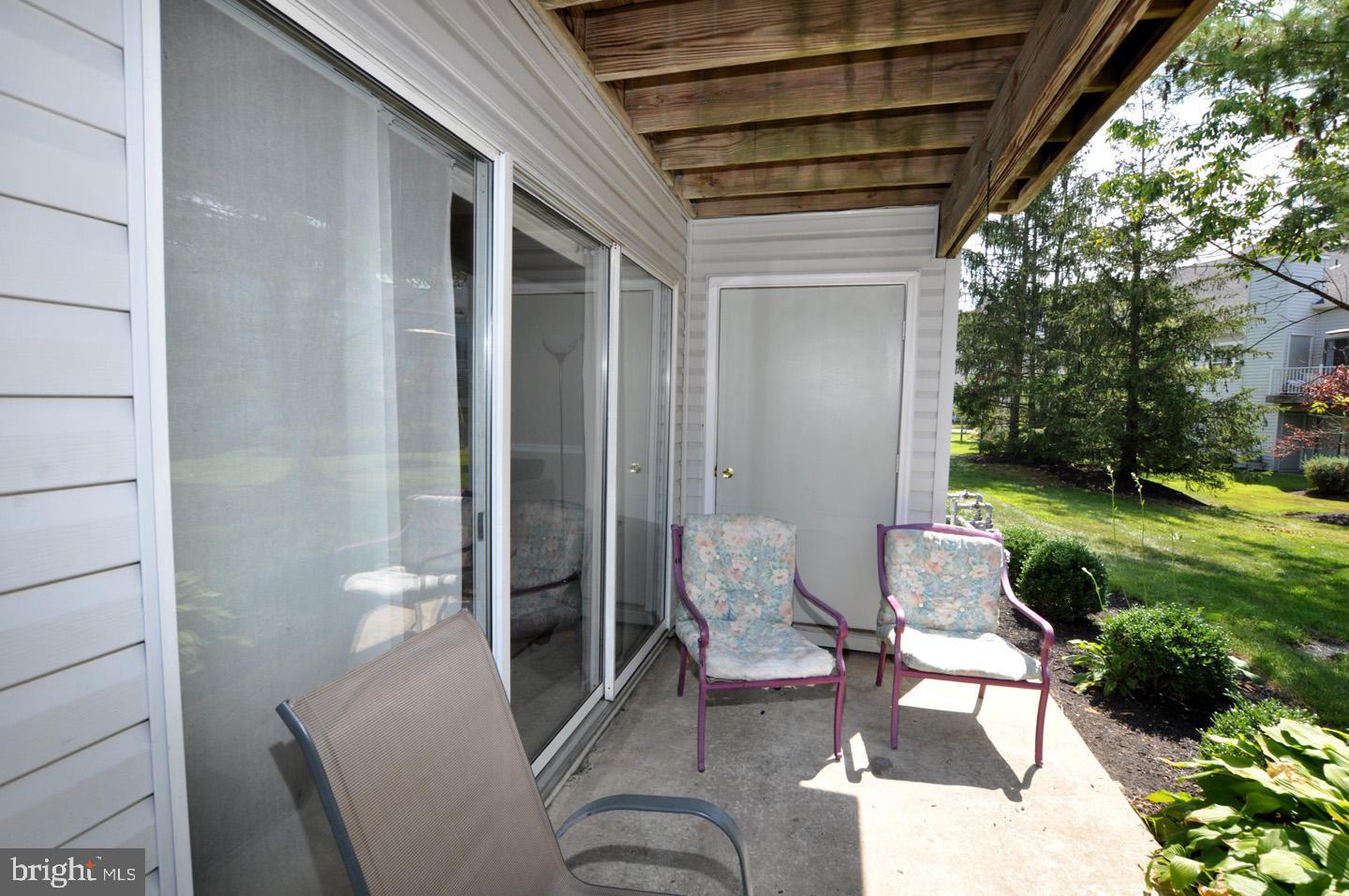1505 Squirrel Road Evesham, NJ 08053 - Photo 22 of 23 a backyard of a house with outdoor seating