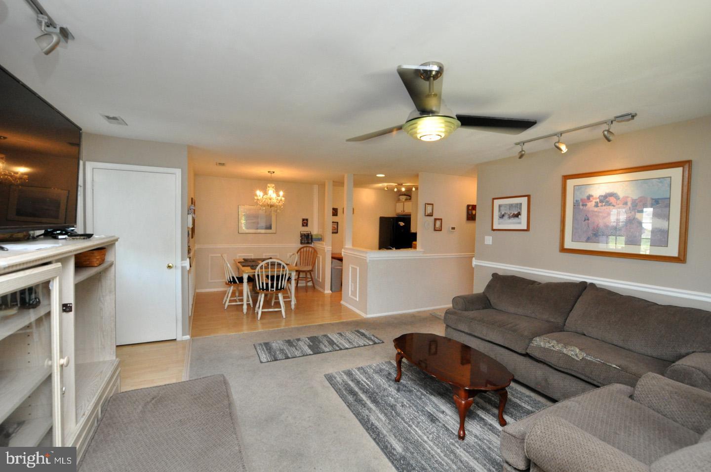 1505 Squirrel Road Evesham, NJ 08053 - Photo 4 of 23 a living room with furniture and a flat screen tv