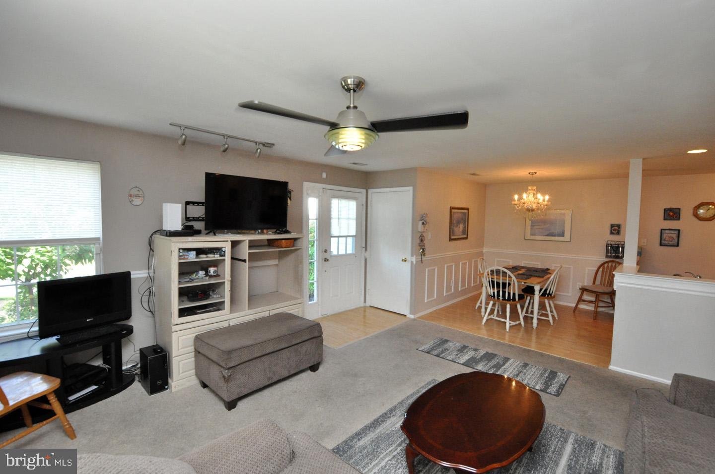 1505 Squirrel Road Evesham, NJ 08053 - Photo 5 of 23 a living room with furniture and a flat screen tv