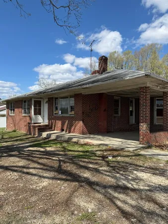 a view of a house with a patio