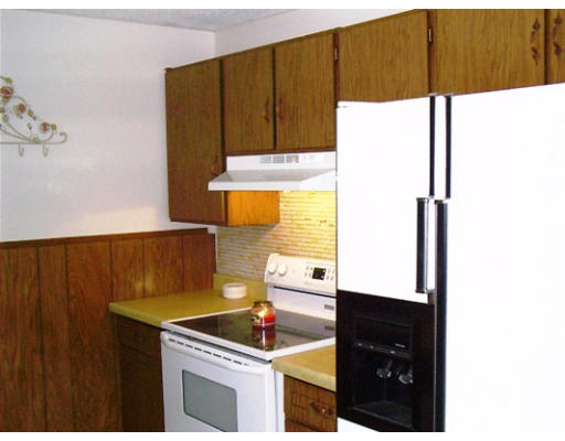 190 Center Depot Road Charlton, MA 01507 - Photo 4 of 18 a kitchen with a sink and a stove