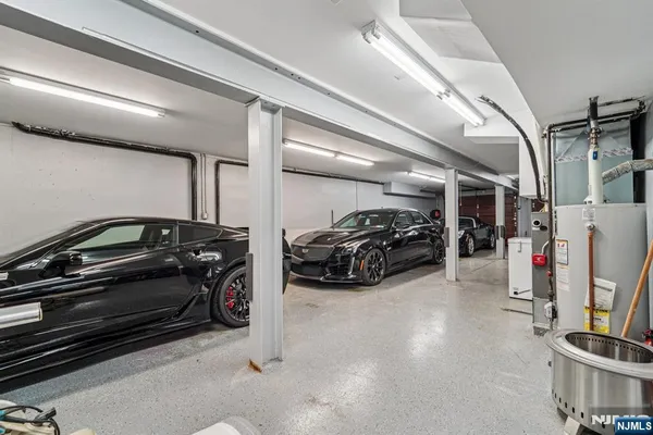 a view of parking garage with cars