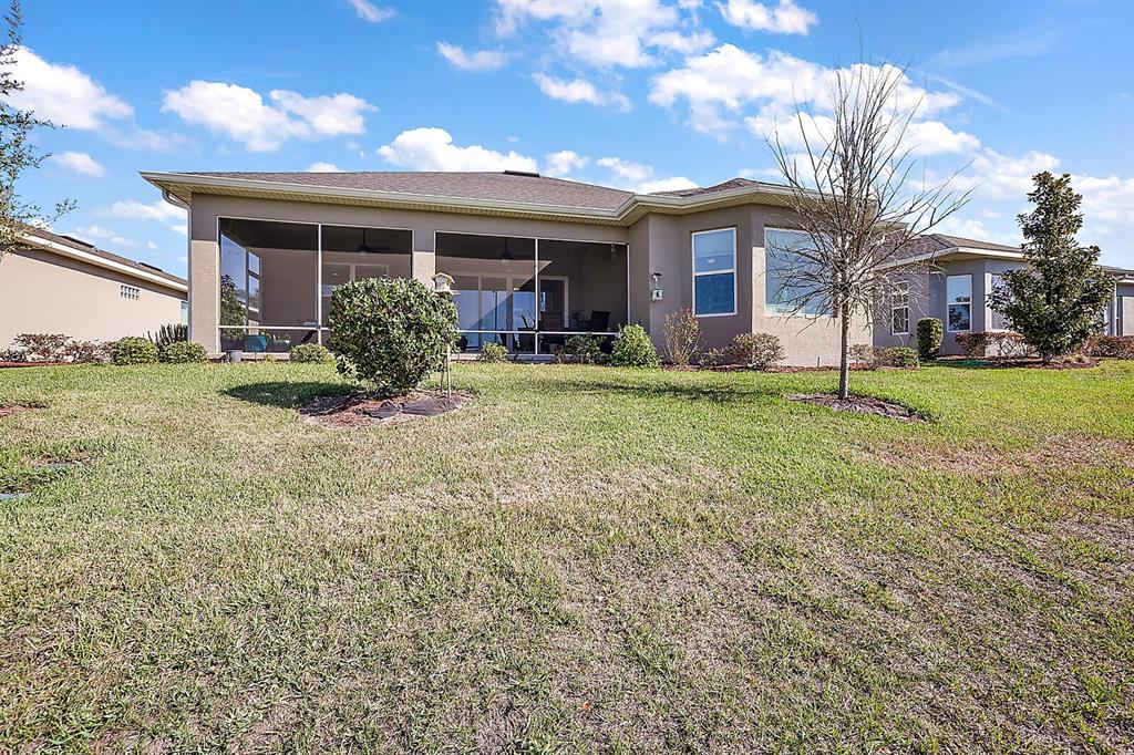 5129 Jared's Landing Way Oxford, FL 34484 - Photo 38 of 41 a view of a house with a yard
