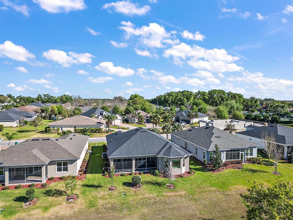 5129 Jared's Landing Way Oxford, FL 34484 - Photo 39 of 41 an aerial view of residential houses with outdoor space