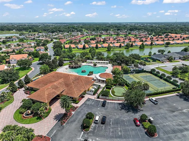 an aerial view of residential houses and outdoor space