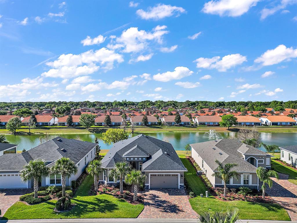 5129 Jared's Landing Way Oxford, FL 34484 - Photo 4 of 41 an aerial view of a house with a lake view