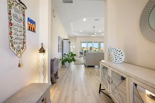 a view of kitchen with furniture and wooden floor