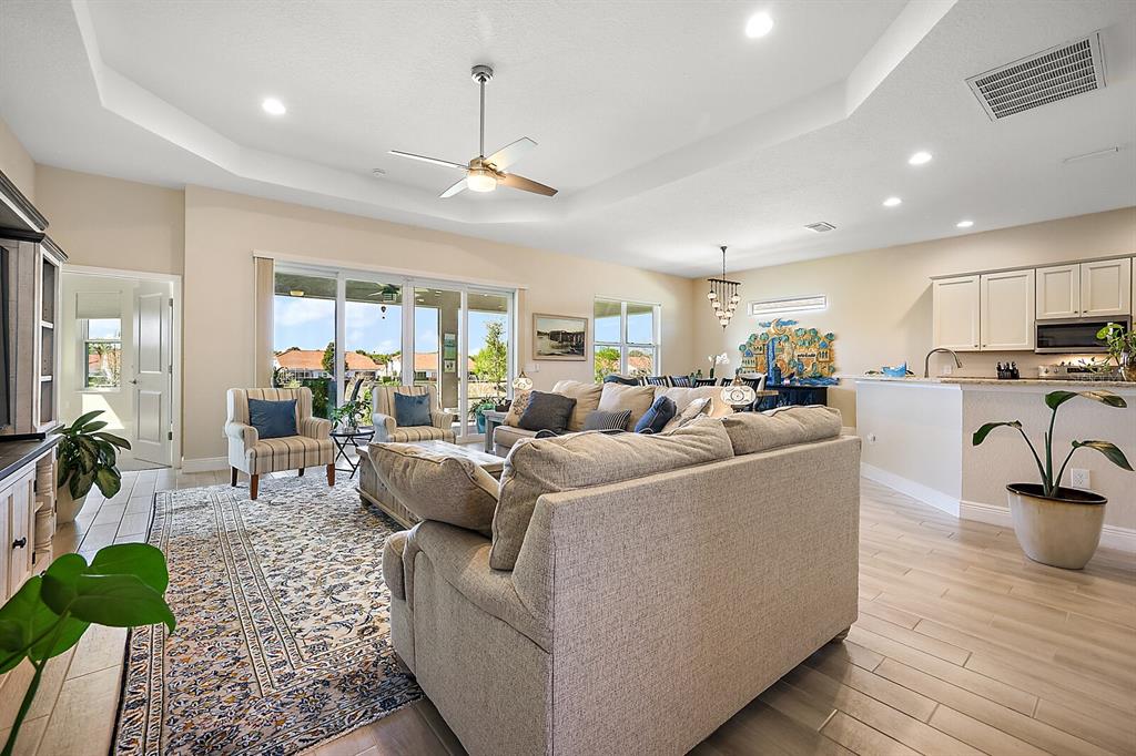 5129 Jared's Landing Way Oxford, FL 34484 - Photo 8 of 41 a living room with furniture and a large window