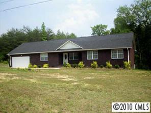 739 Stone Road Salisbury, NC 28146 - Photo 1 of 8 a front view of a house with a garden