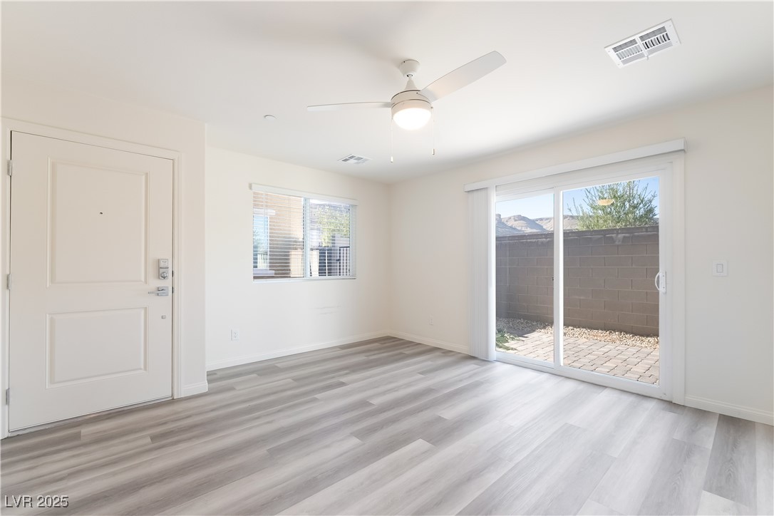 6853 Prairie Pearl Street Las Vegas, NV 89148 - Photo 8 of 22 Entry way living area downstairs.