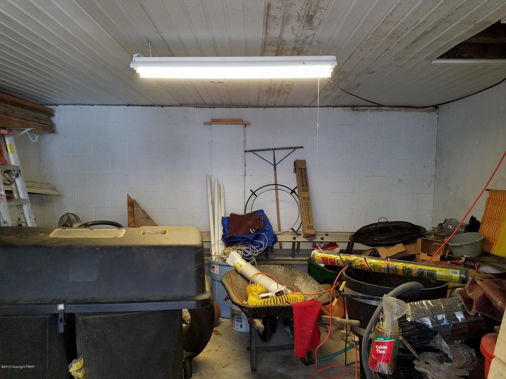 112 Teal Court Bushkill, PA 18324 - Photo 14 of 35 garage storage