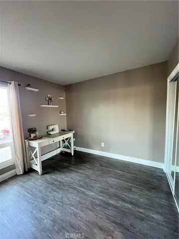 a room with furniture and window