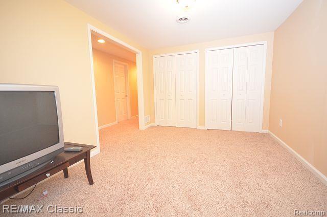 27458 Cromwell Road Novi, MI 48374 - Photo 31 of 39 This space in the basement could easily become a 4th bedroom, home office or craft room.