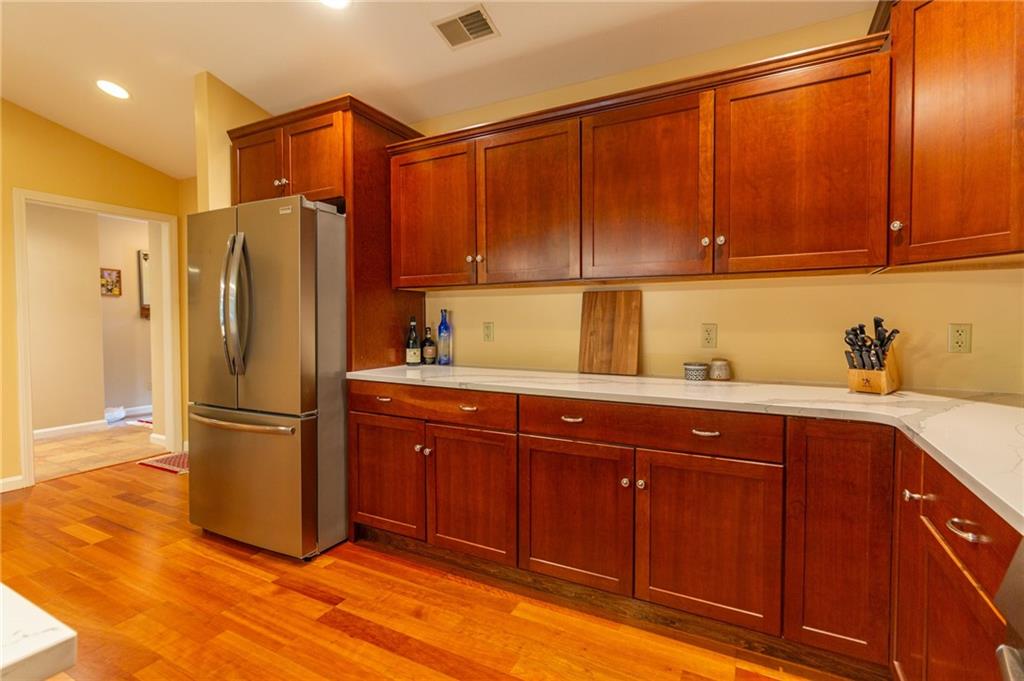 138 Abbey Road New Castle, PA 16105 - Photo 16 of 36 a kitchen with stainless steel appliances granite countertop a refrigerator and a sink