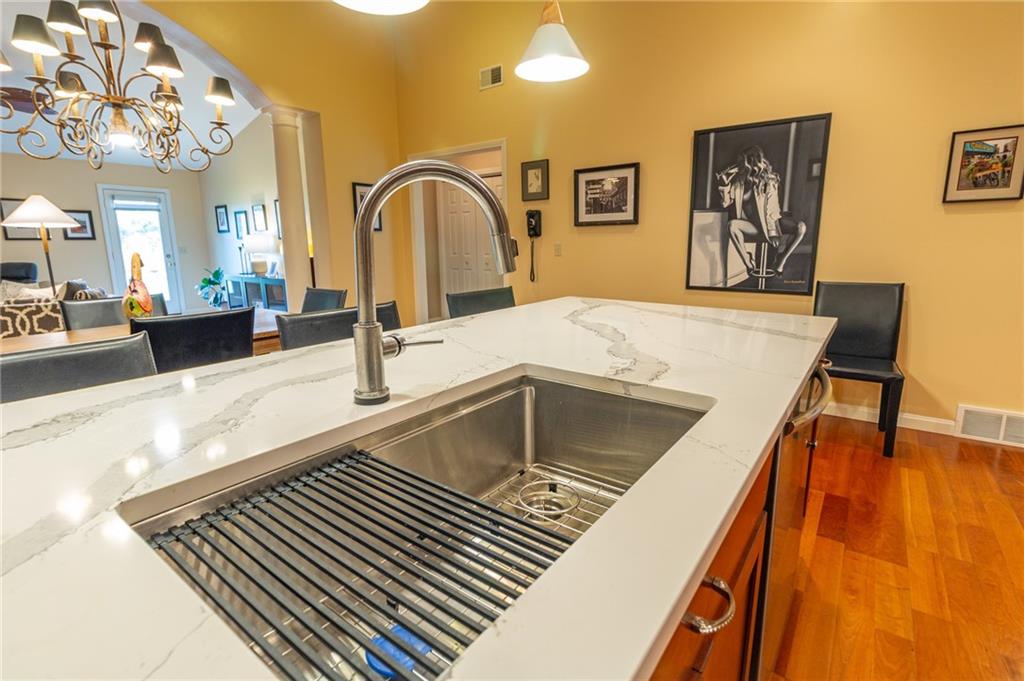 138 Abbey Road New Castle, PA 16105 - Photo 17 of 36 a kitchen with a sink and a refrigerator