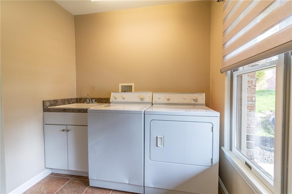 138 Abbey Road New Castle, PA 16105 - Photo 24 of 36 a utility room with dryer and washer